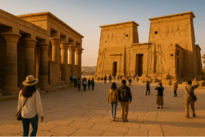 Visitors exploring Philae Temple in Aswan