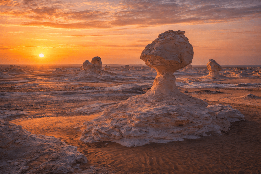 White Desert rock formations in Bahariya Oasis Egypt at sunset
