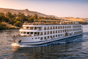 Nile cruise sailing past temples Egypt