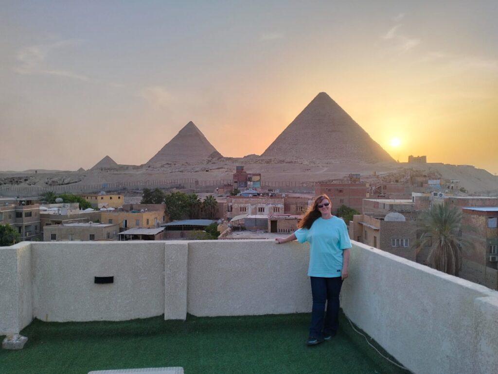 rooftop guesthouse view of pyramids