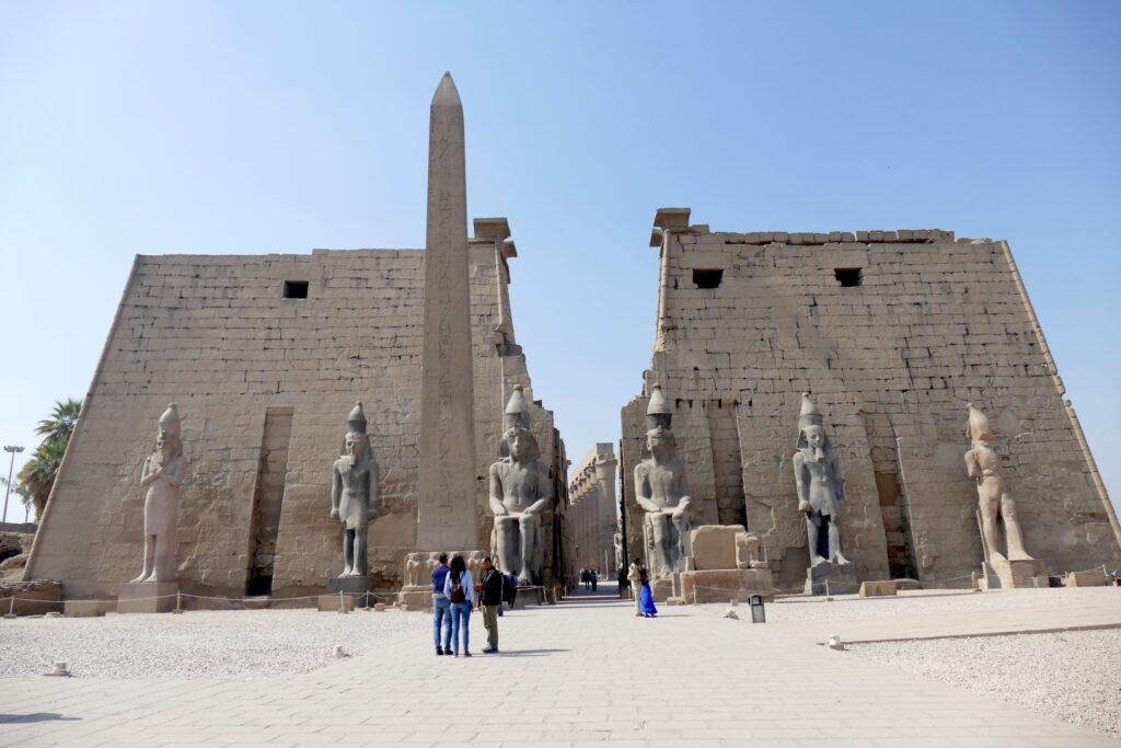 Ramesses II pylon, statues and surviving obelisk at Luxor Temple.