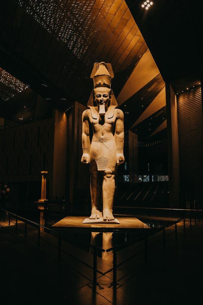 Colossal statue of Ramses II inside the Grand Egyptian Museum.