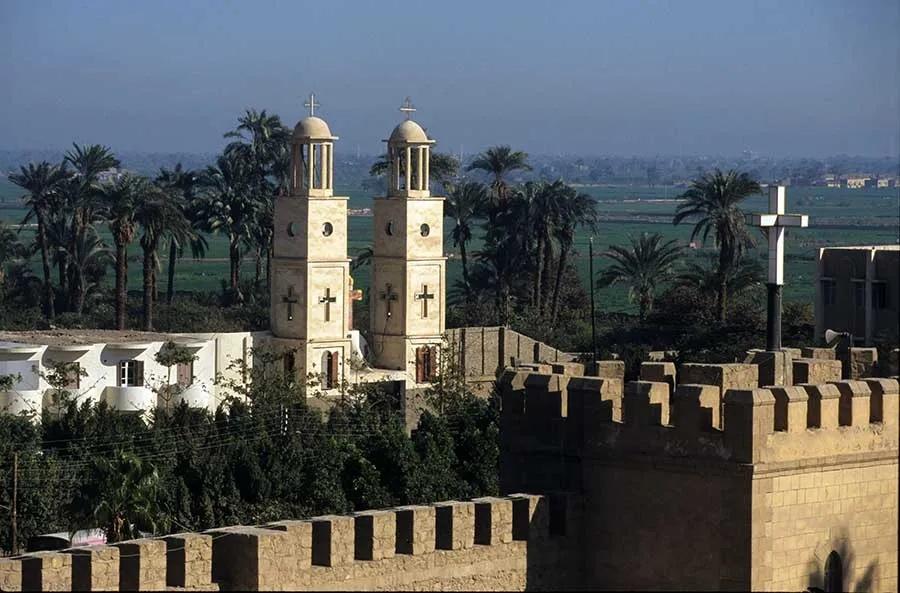 Al-Muharraq Monastery surrounded by farmland near Al-Qusiya, Egypt