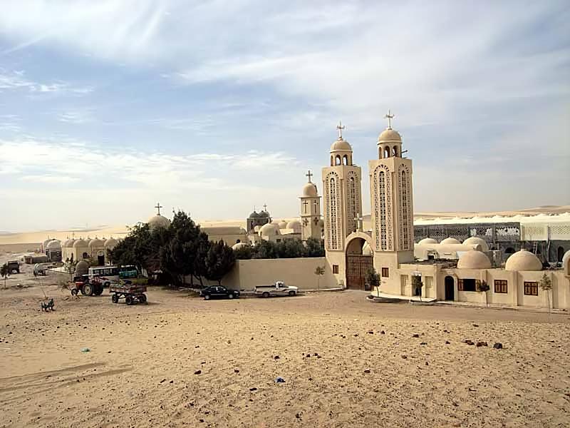 Entrance and monastery buildings at Abu Fana Monastery in Minya, Egypt