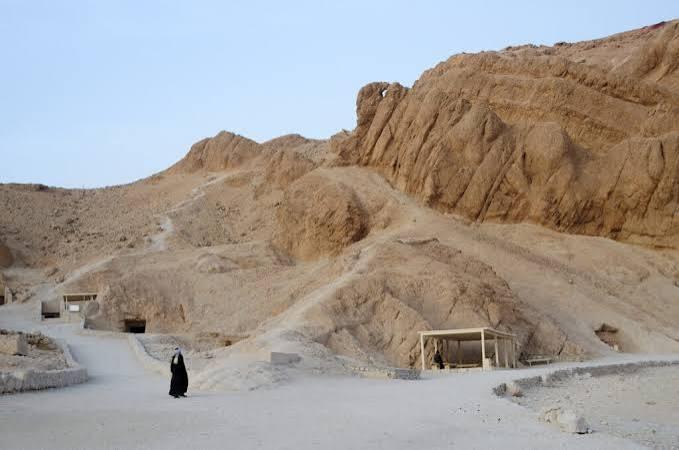 Exposed desert walking paths between tombs in the Valley of the Queens.