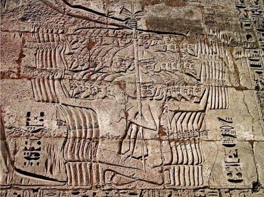 Ramesses III naval battle reliefs depicting conflict with the Sea Peoples at Medinet Habu.