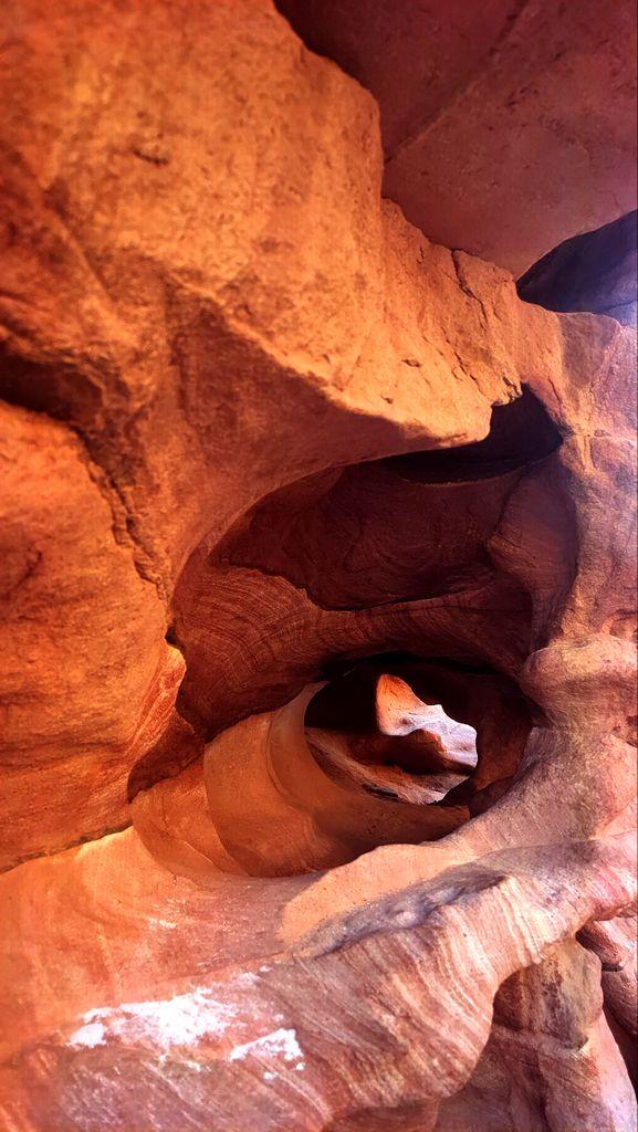 Explore the unique red rock formations of Egypt's Dahab Canyon.