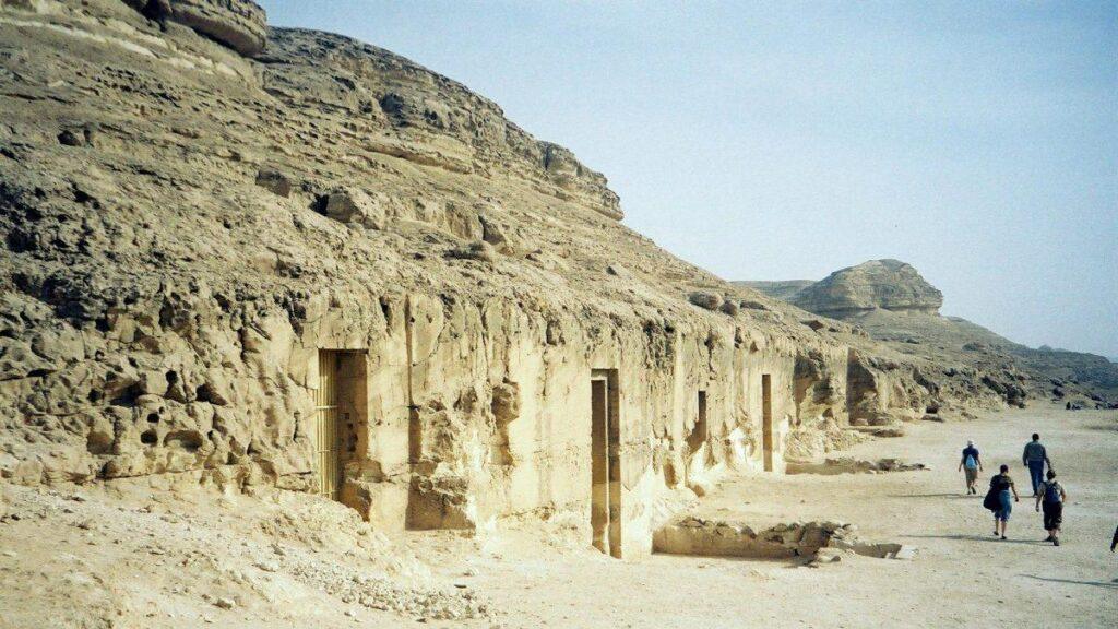 Rock-cut tomb entrances in the cliffs at Beni Hasan, Minya Governorate, Egypt.