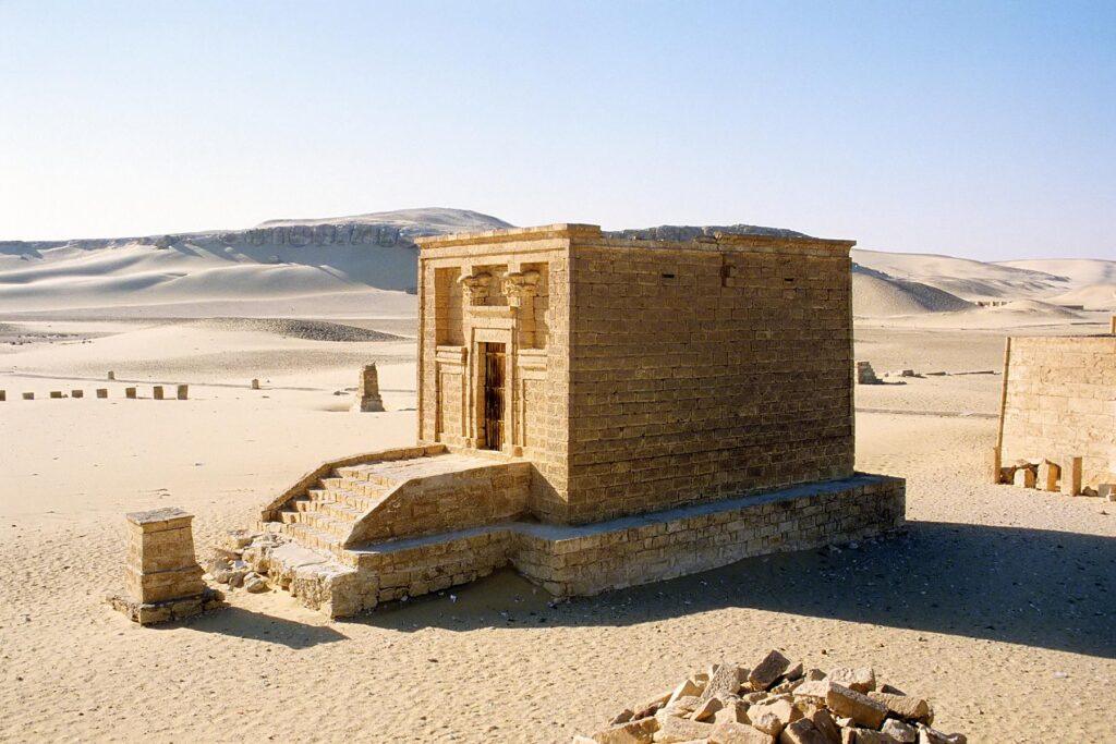 Tomb of Isadora on the left among ancient funerary buildings at Tuna el-Gebel in Egypt.
